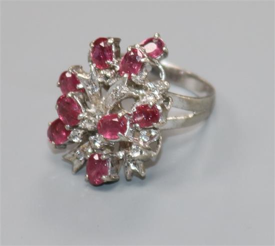 A white metal, pink and white gem set cocktail ring, size L/M
